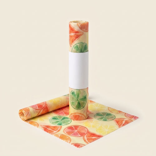 Bienenwachstuch im Zitrusdesign mit Grapefruit, Limette und Zitrone (KI-generiert)